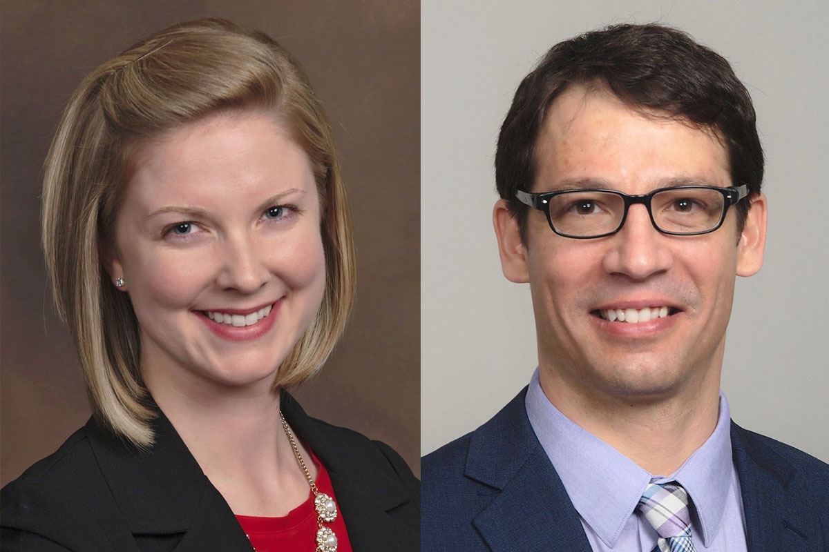A woman with short blonde hair and a man with short dark hair and glasses, both wearing business attire, posed against neutral backgrounds.