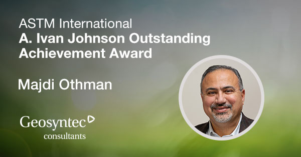 Banner announcing the ASTM International A. Ivan Johnson Outstanding Achievement Award, showcasing Majdi Othman's portrait and the Geosyntec Consultants logo on a blurred green background.